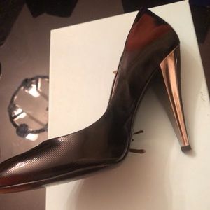 Black Marciano pumps, silver heel and inside sole